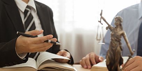 Immigration attorney assisting a client with their visa application timeline