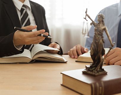 Immigration attorney assisting a client with their visa application timeline